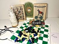 All items grouped: lamp, chess set, four prints