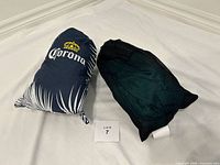 Both hammocks in storage bags side by side