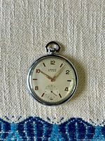 Front view of 1940s Lanco pocket watch showing dial, hands, and numerals.