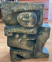 Front view of abstract cubist stone sculpture
