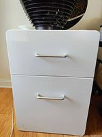 Front view showing both drawers and handles