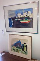 Both framed paintings displayed together for scale and style comparison