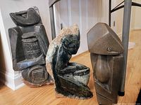 Three Shona stone sculptures grouped together