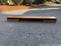 Front view showing drawers, slots, cubbies