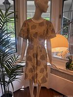 Full front view of dress on mannequin