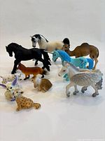 Group view of all eleven animal figurines