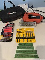 Overview of jigsaw, carry case, blade sets