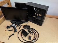 Overall lot with computer case, monitor, cables, mouse, devices