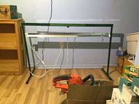 Overall view of grow light on green stand