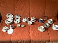 Group shot of entire lot on sofa