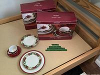 Two boxed 20-piece Joshua Maxwell Studio Holiday Magic sets on table