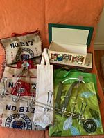 Group shot of all bags, over-door hanger and holiday box