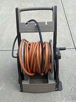 Front view of Ames hose reel with hose