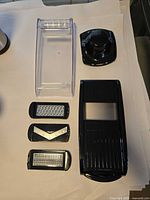 Mandoline slicer components laid out