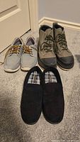 All three pairs of footwear arranged together