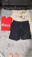 Group view of three shorts and Budweiser T-shirt