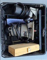 Router, bits and accessories inside DeWalt case