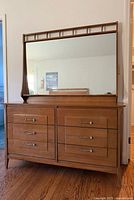 Front view of dresser with attached mirror