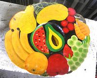 Front of platter showing full painted fruit and vegetable design