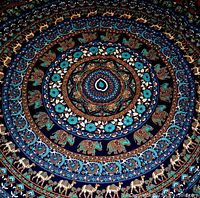 Full view of mandala design showing elephants and floral rings