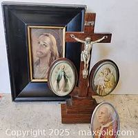Group shot showing crucifix with attached ovals, framed Jesus portrait, and separate oval plaque