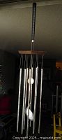 Full view of golf club wind chime hanging