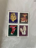 Mushroom 38¢ stamp block inside album