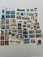 Overview of all mint Canada postage stamps spread out