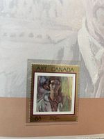 Art Canada 88¢ stamp mounted in album