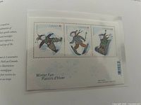 Winter Fun souvenir sheet mounted in book