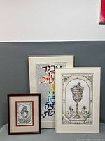 Overview of three framed Judaica lithographs
