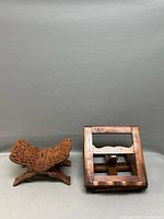 Both wooden book stands side by side, folded