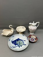 Group shot of all five porcelain pieces