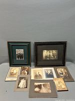 Group shot of entire lot showing two framed photos and eight mounted pieces