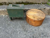 Shoeshine box and cheese box side by side