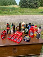 Entire lot of car-care and fuel additive products on table