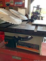 Black & Decker table saw front view with gauge and power switch visible