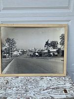 Front view of framed photograph showing full image and frame