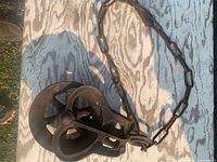 Pulley and chain full view on tabletop