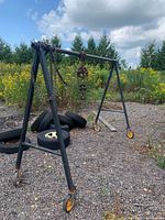 Full view of gantry crane with chain hoist attached, casters visible