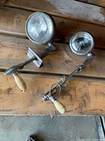 Both chrome searchlights showing overall design and handles