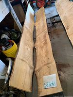 Top view of both pine slabs showing live edges and length