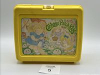 Front view showing Cabbage Patch Kids graphic panel and overall colour