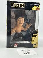 Front view of boxed Bruce Lee figure