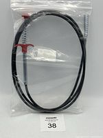 Full view of sealed bag containing flexible grabber claw tool