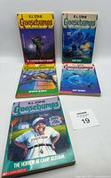 All five Goosebumps books laid out