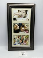 Front view showing bronze-tone border, cream mat and three sample photos