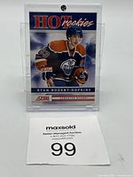 Front view of the Ryan Nugent-Hopkins Hot Rookies card in holder with lot number slip