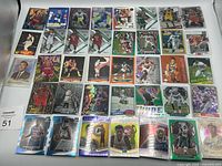Full lot layout of 38 sports cards displayed in rows