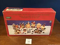 Front of Danson box showing Little Christmas Village 19-piece set